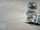 Steinoptik_Platten_Mountain_Silver_mit_Vase_und_Zeitschrift