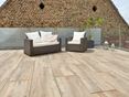 Dachterrasse mit Lounge-Möbeln und Terrassenplatten in Holzoptik Canada Lodge